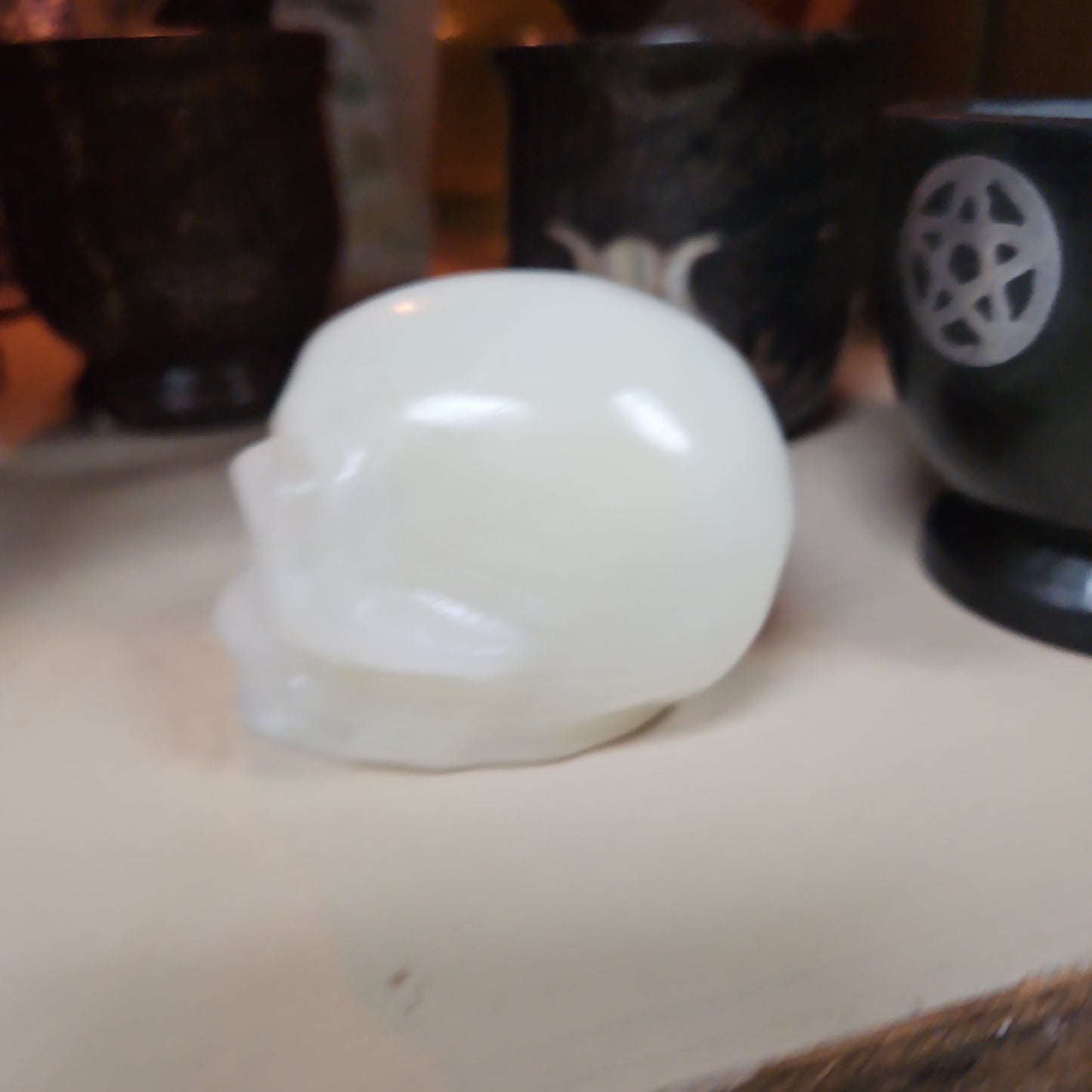 White Banded Agate Skull 2 1/2 by 3”