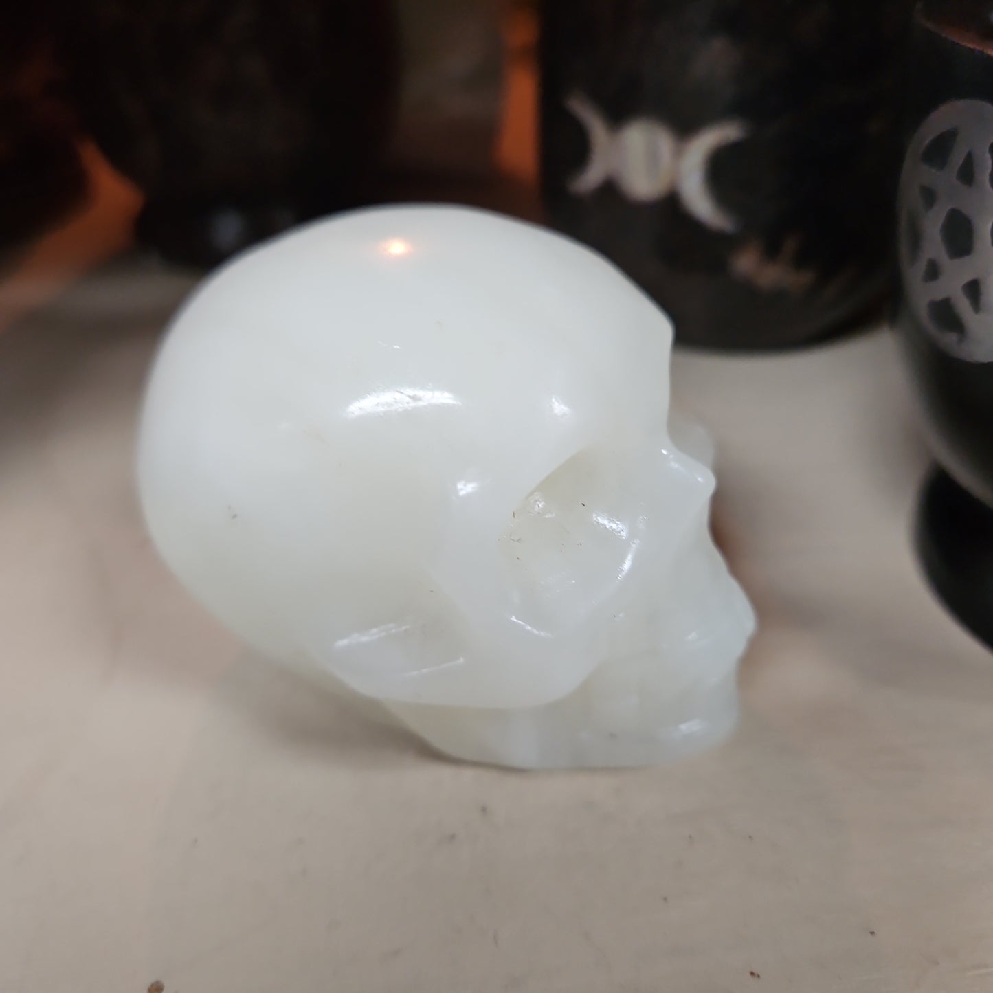 White Banded Agate Skull 2 1/2 by 3”